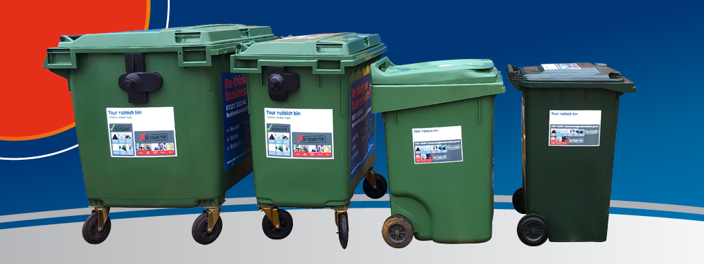 Green waste bins lined up from biggest to smallest